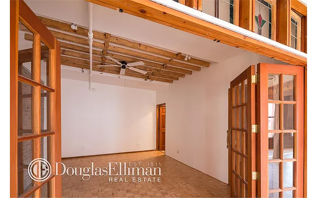 Sold by Douglas Elliman | media 18