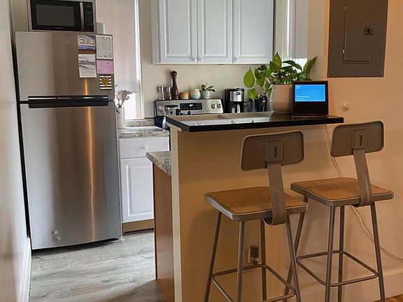 Galley Kitchen With Breakfast Bar
