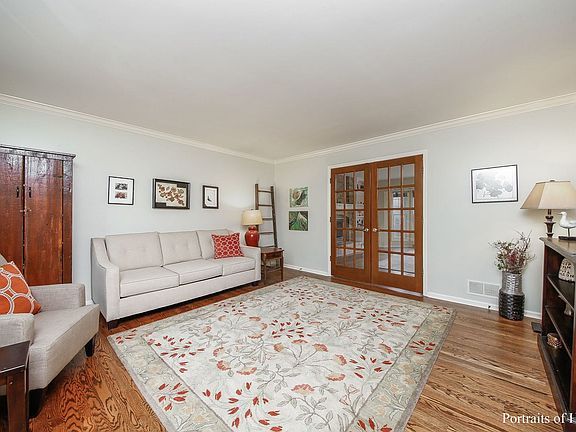 Living Room with French doors leading to family room.