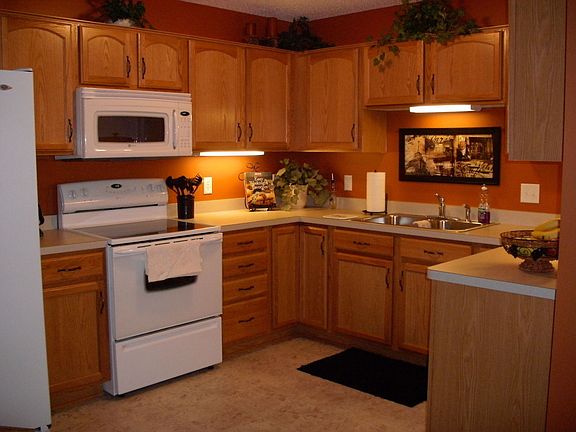 Large central kitchen with designer appliances and many cabinets