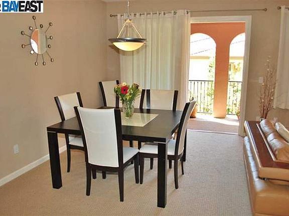 Dining area opens to private balcony