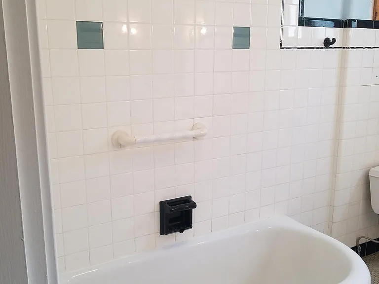 Restored tub surround.