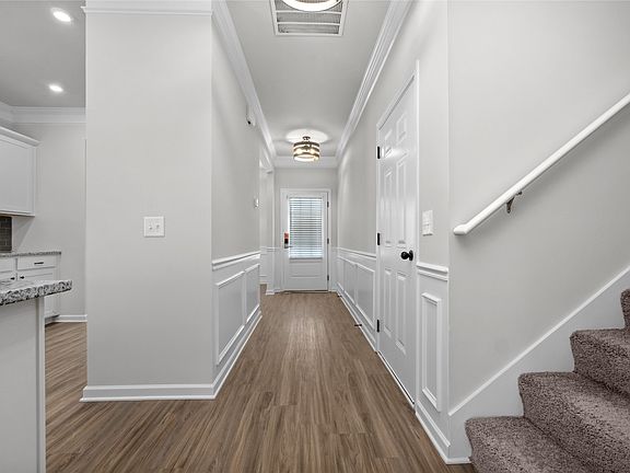The Caldwell- Foyer and Kitchen. Photo used for illustration only actual features, colors, and upg