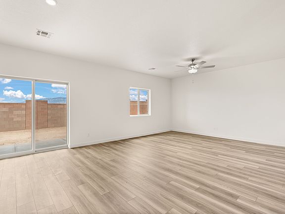 The living area is filled with natural lighting.