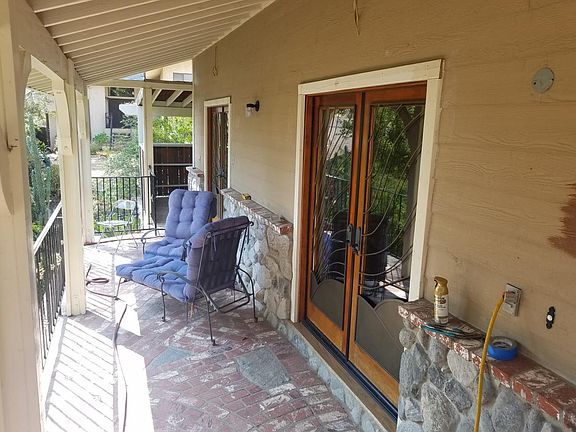 Veranda patio ; brick and stone ;