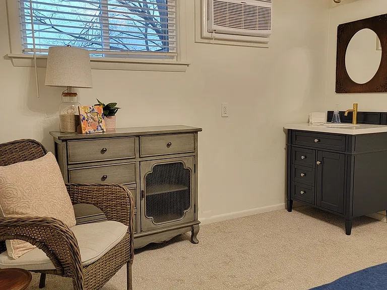 Bedroom #3 has a walk in closet, sitting area, and new high-end vanity sink