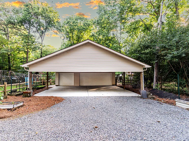 Massive 3-car garage, carport and a finished room above the garage.