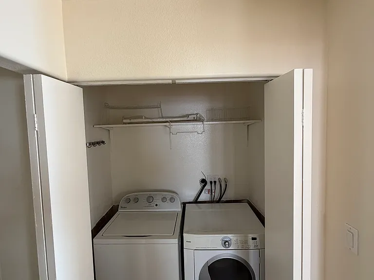 Laundry space includes a washer/dryer that may be used or removed upon request.