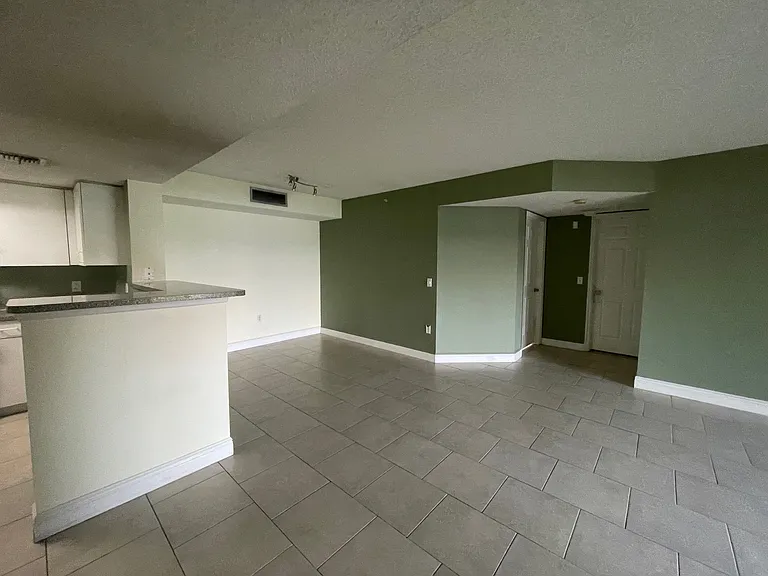 5005 Wiles Rd #102 — Photo 12