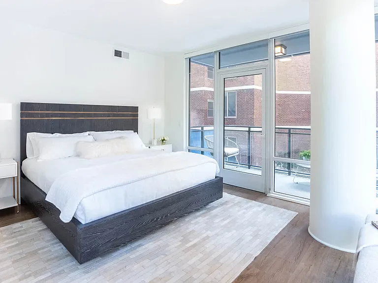 Bedroom with Balcony and Hard Surface Flooring