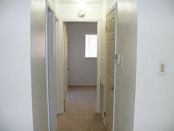 Before heading to the kitchen, let's take a right from the front door to your secondary bedrooms and