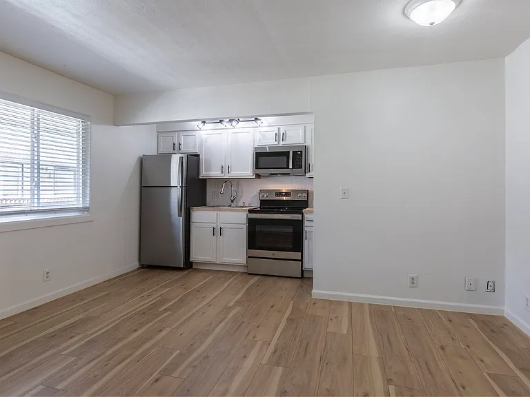 Large living room in a unit at Cuming St. Apartments.