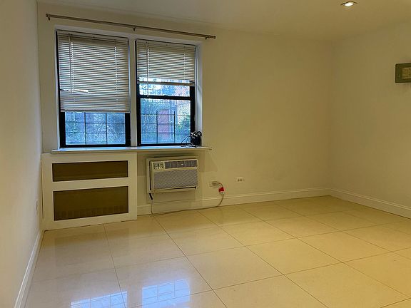 4th image of 65-50 Wetherole St #1T