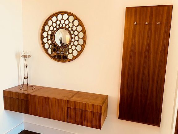 Walnut cabinets in foyer