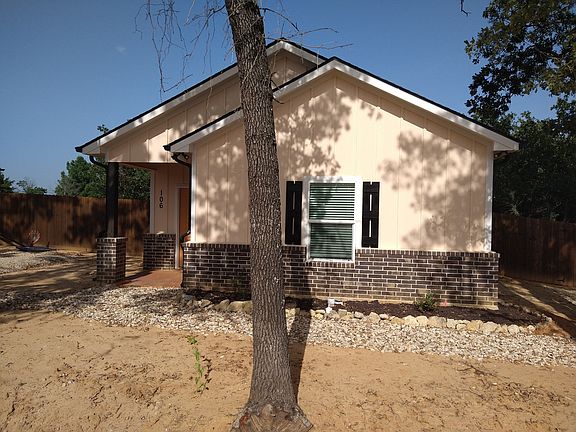 Photo is a similar unit by the same builder from 1000 Wooded Hollow