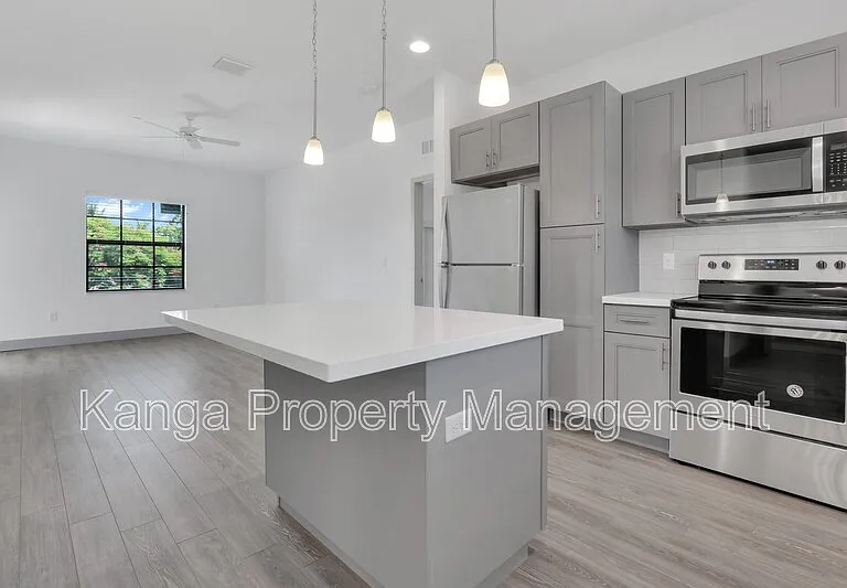 540 NE 14th Ct #104 — Photo 2