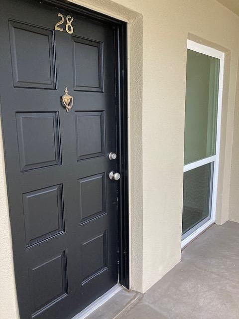 Front door and balcony