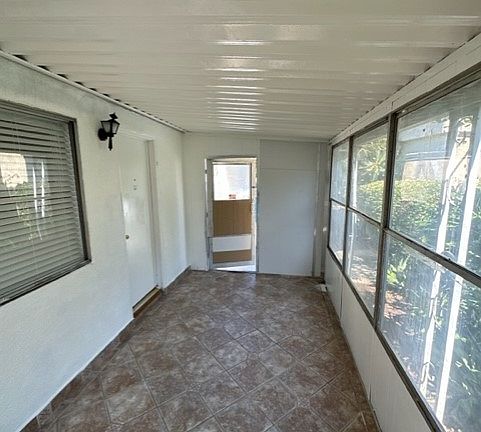 Another view of the enclosed patio in the opposite direction