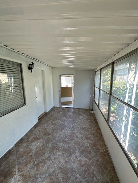 Another view of the enclosed patio in the opposite direction