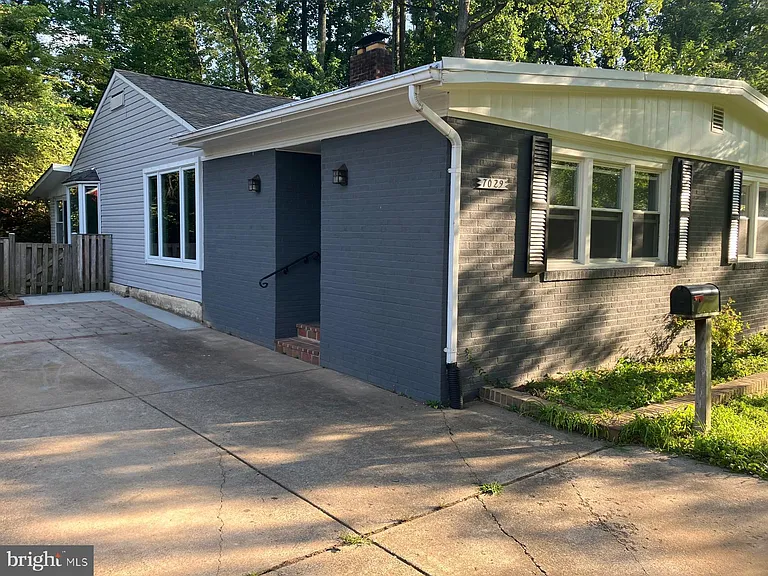 7029 Woodley Ln — Photo 2