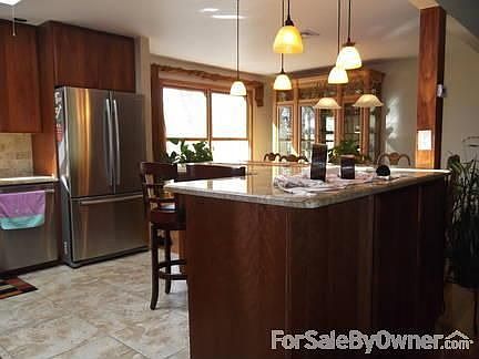 Kitchen
						:
						SS appliances, cherry wood cabinets, recessed lighting, skylight, granite.