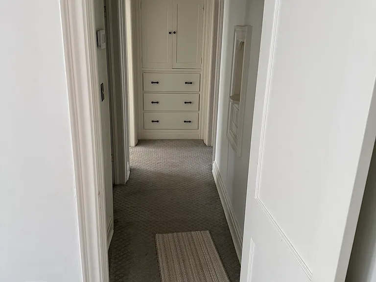 Hall between Master bedroom and Bedroom #2 plus storage in hall