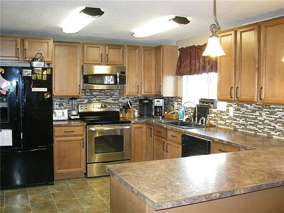 3rd image of 10135 Kory Ln NE