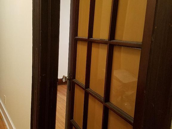 Door that separates the whole-way and living room