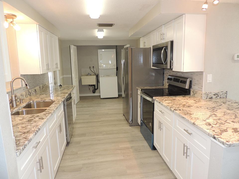 new soft close shaker cabinets and granite counters, laundry inside home, new appliances, new lighting