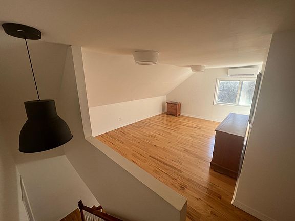 View of the bedroom from the top of the stairs
