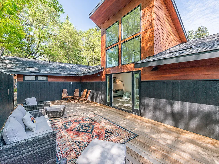 Architectural exterior with direct deck access