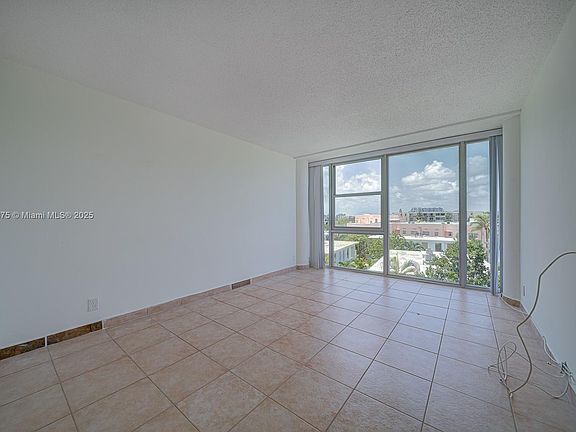 5th image of 900 Bay Dr APT 303