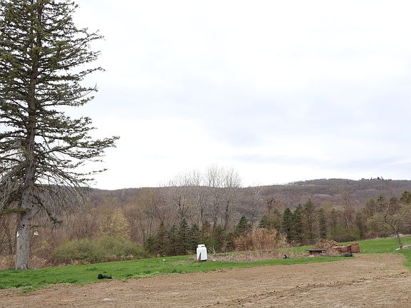 The view looking from the patio! The grass should be grown back very soon seed has been planted.