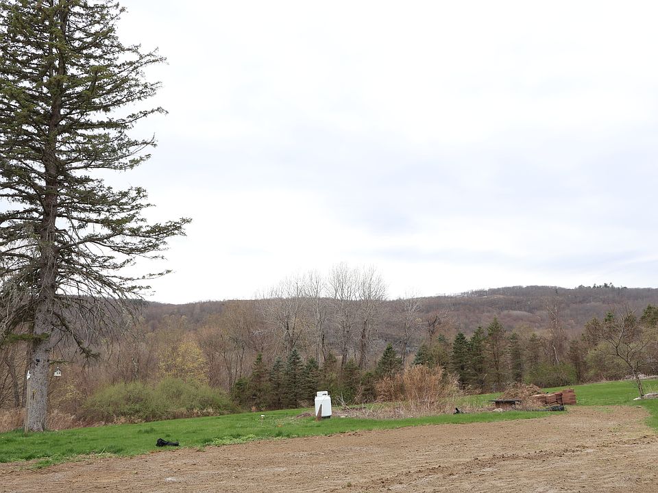 The view looking from the patio! The grass should be grown back very soon seed has been planted.