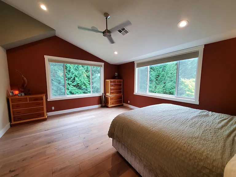 Oversized primary bedroom has vaulted ceilings, large windows and is located at the end of the 2nd floor, for privacy.