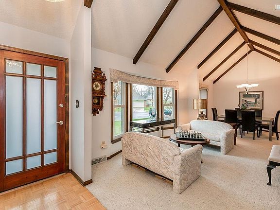 Large Entry w/ Formal Living & Dining Room with Beamed Vaulted Ceilings!