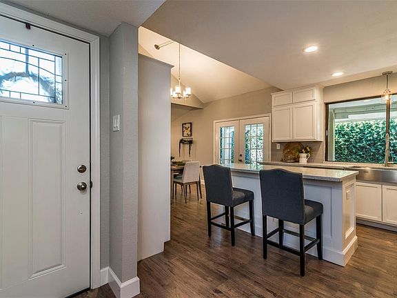 All new kitchen cabinets, custom island, quartz countertops, apron front farmhouse sink and all new appliances.