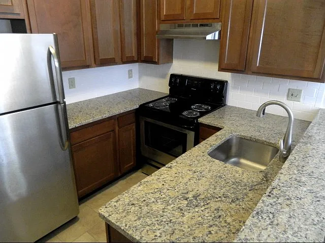 Premium Townhomes offer granite countertops and gorgeous appliances.