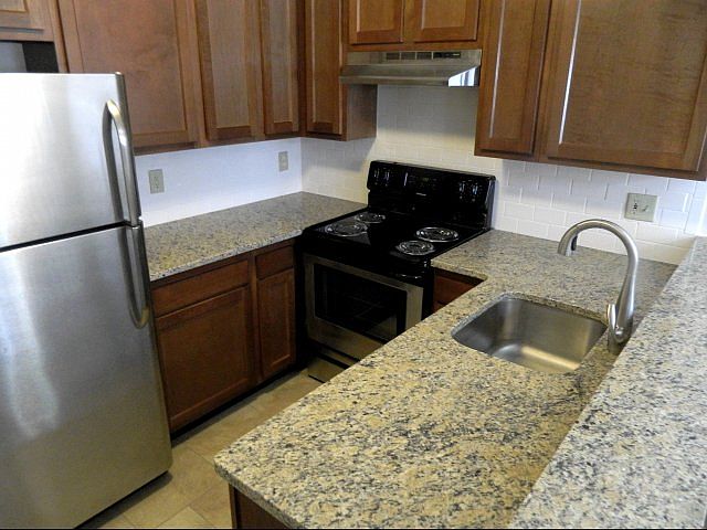 Premium Townhomes offer granite countertops and gorgeous appliances.