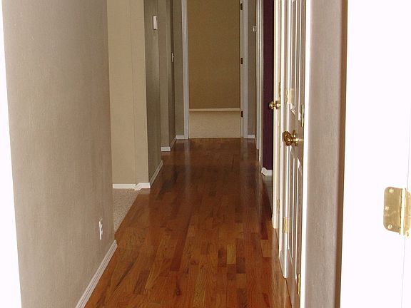 Hallways feature hardwood floors as well