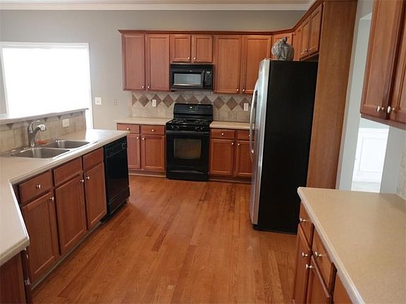 Spacious Kitchen with entrances to dining room and living room