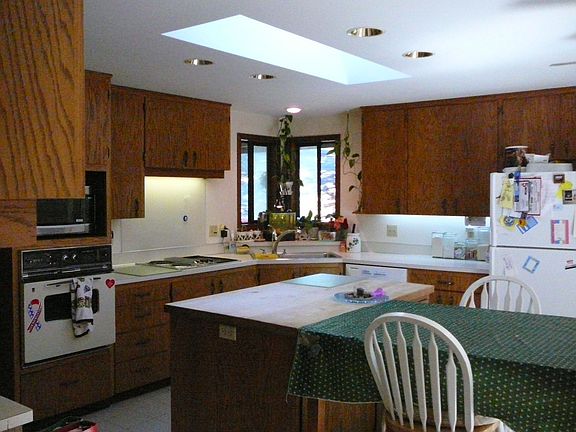 Large eat-in kitchen with views. 
