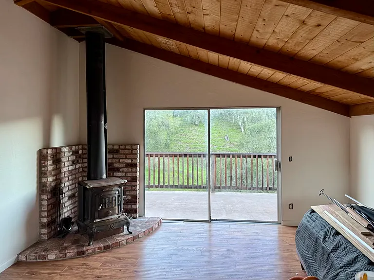 Great Room with access to rear deck overlooking oak-studded hills