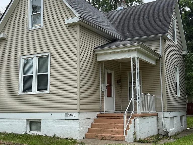 7048 Raymond Ave — Photo 1