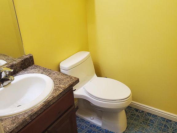 Main floor half bathroom. Tried out some new tile with lively paint.