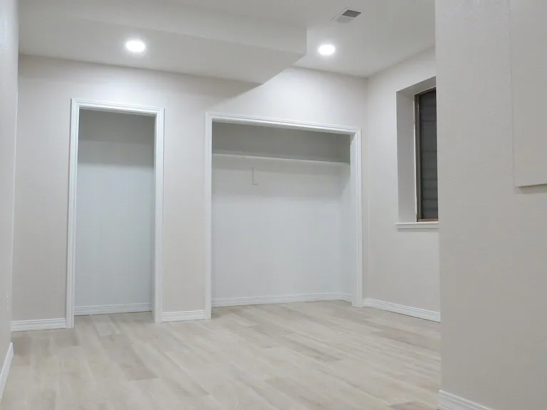 Basement bedroom (connects to bath and living area)