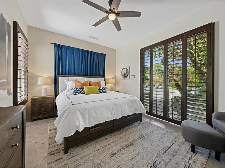 Poolside Suite with king bed and ensuite full bath; access to the pool/spa