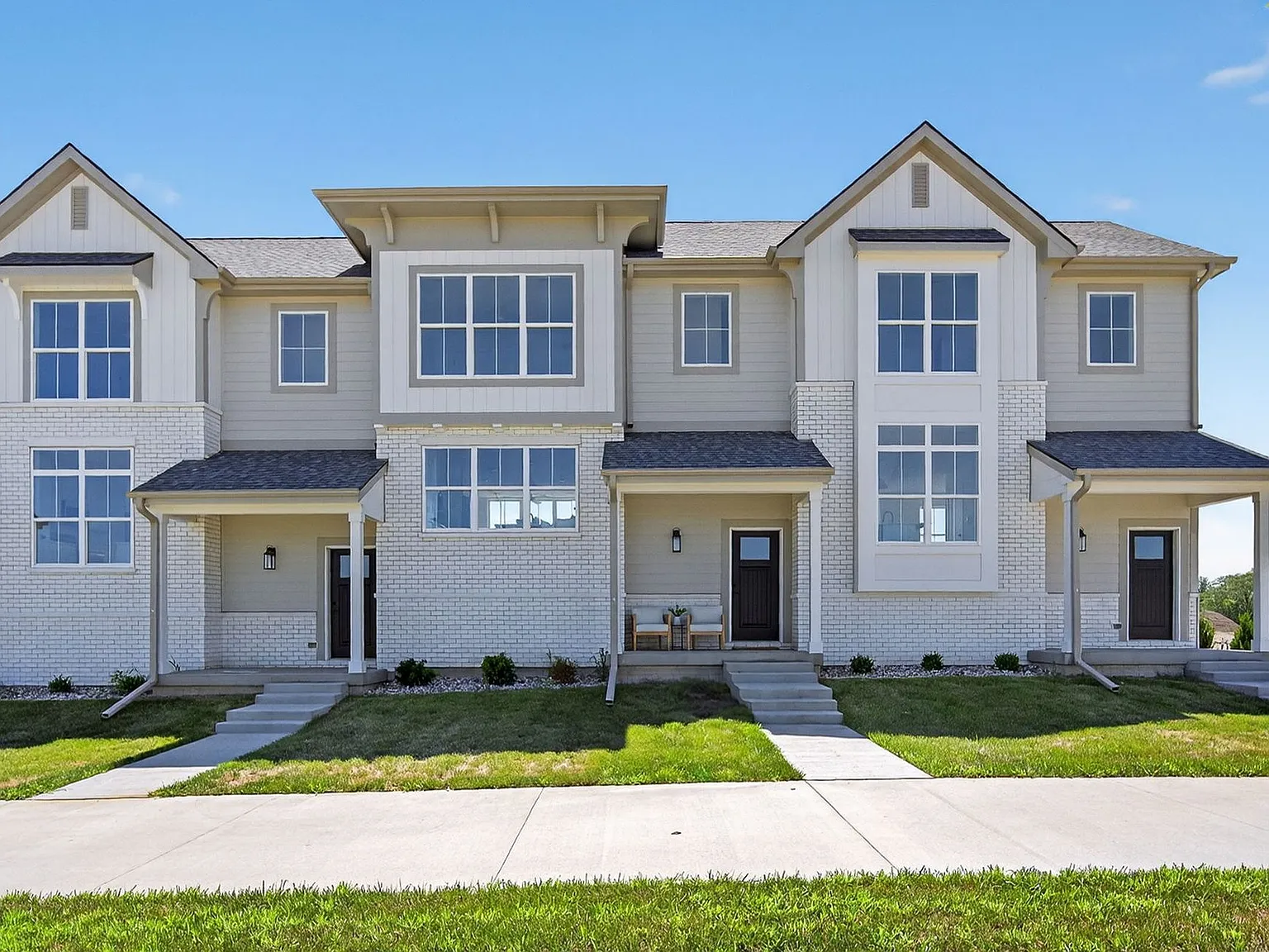 Luxury Townhomes in Waukee's Kettlestone District | Attached 2-Car Garage — Photo 2