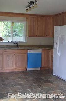 Kitchen
						:
						Includes granite counter top, dishwasher, French door refrigerator, oak cabinets