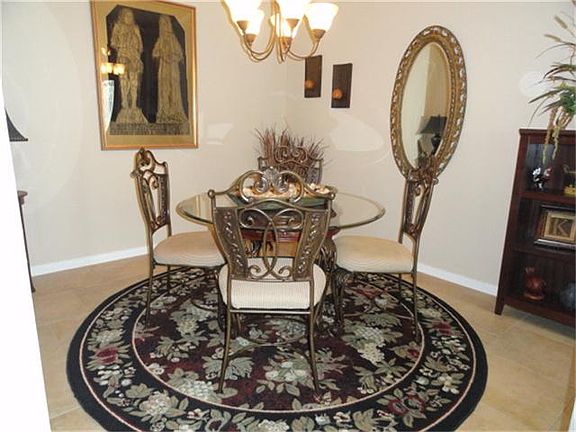  The formal dining room is open to the kitchen and family room.